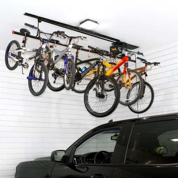 Garage Gator Bike Lift Motorized GG8220 overhead storage 220LBs - raised over car
